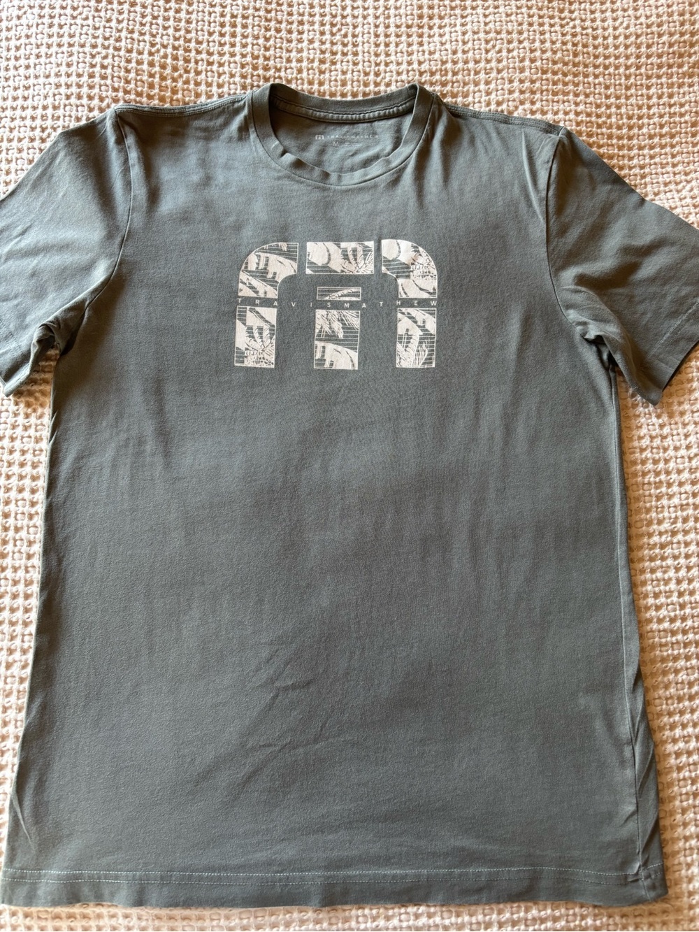 Travis Mathew Olive Short Sleeve Tee with White Logo Print